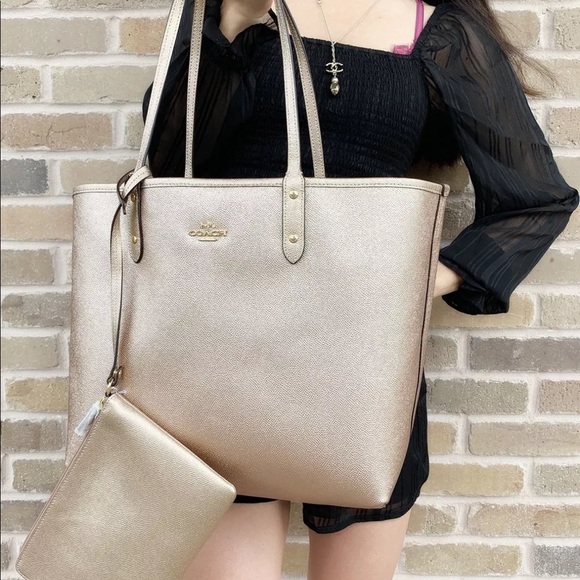 Coach Handbags - Gaby’sBags👜💕- NWT Coach Reversible Tote &Pouch